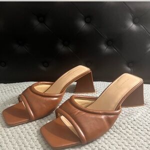 Fashion to figure Brown leather mules with a heel